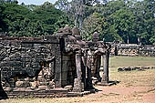 Angkor Thom - Terrace of the Elephants, elephant heads with trunks forming pillars.